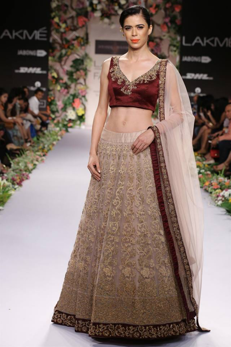 Shayamal and Bhumika - dull gold and maroon Shayamal and Bhumika - dull gold and maroon
