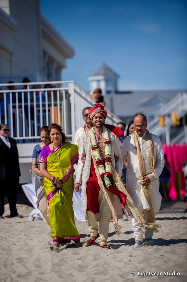 Groom walking into ceremony 