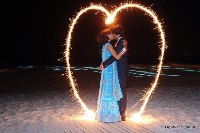 heart fire crackers with couple inside