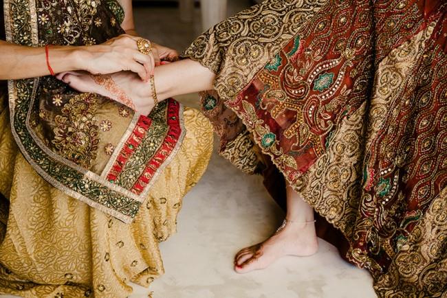 3a- bride putting on payal