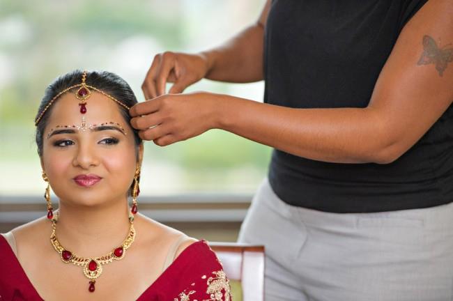 1 indian bride getting ready red jewelry