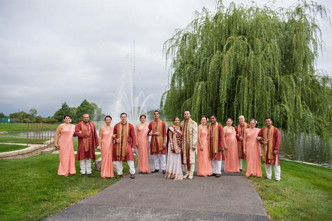 9 indian wedding bridal party portrait orange kurta and sari