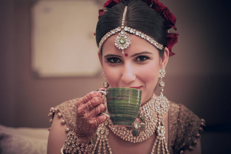 Portrait of a Punjabi bride sitting Stock Photo - Alamy