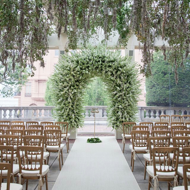 Image 3 elegant and lush green archway. image by @ samuellippkestudios