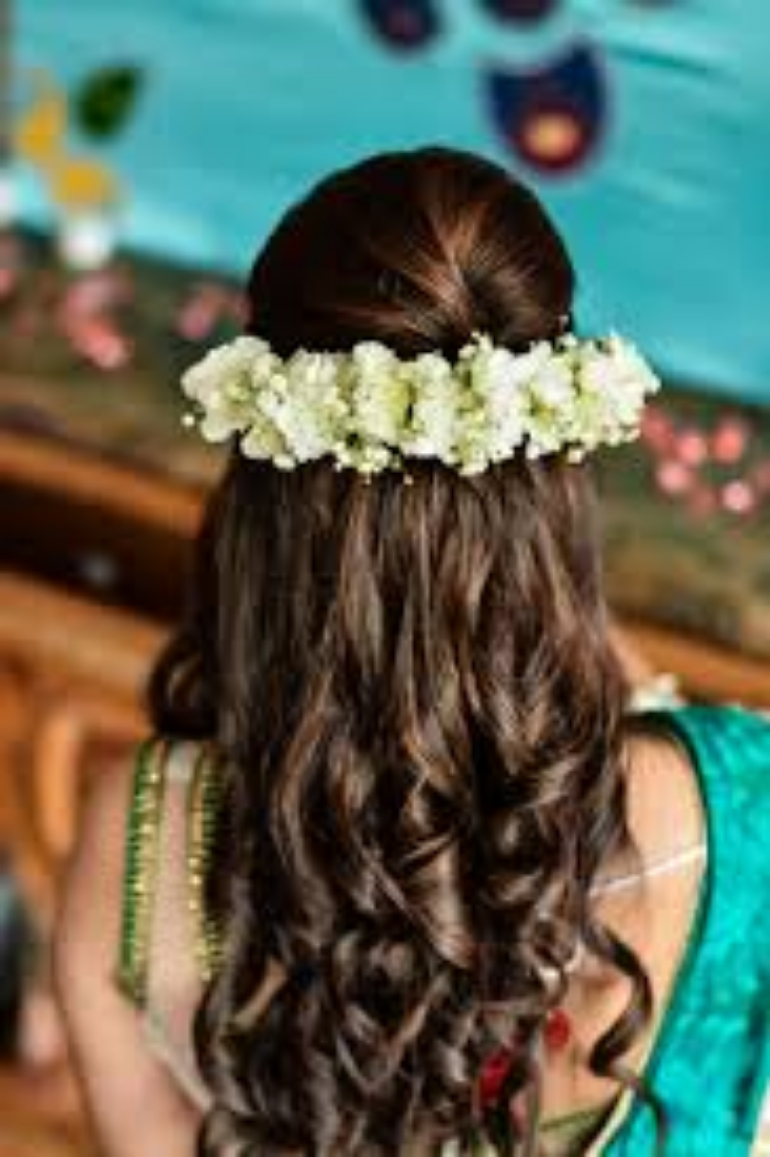 An Indian Bride's Guide to Wearing Flowers in Hair An Indian Bride's Guide to Wearing Flowers in Hair