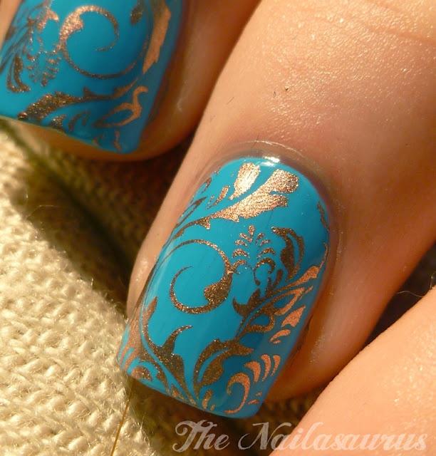 gold designed blue nailpolish design