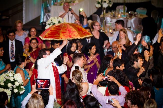 27p indian wedding guests dancing
